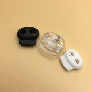 Plastic double-hole cord stop/ toggle, (NXX0170:0172)
