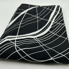 Load image into Gallery viewer, Slinky, White Waves on Black (KIT0202)
