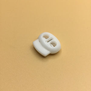 Plastic double-hole cord stop/ toggle, (NXX0170:0172)